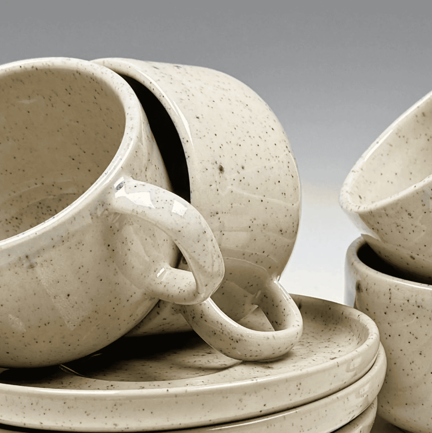 Set Tasse + Teller Emma - creme gesprenkelt